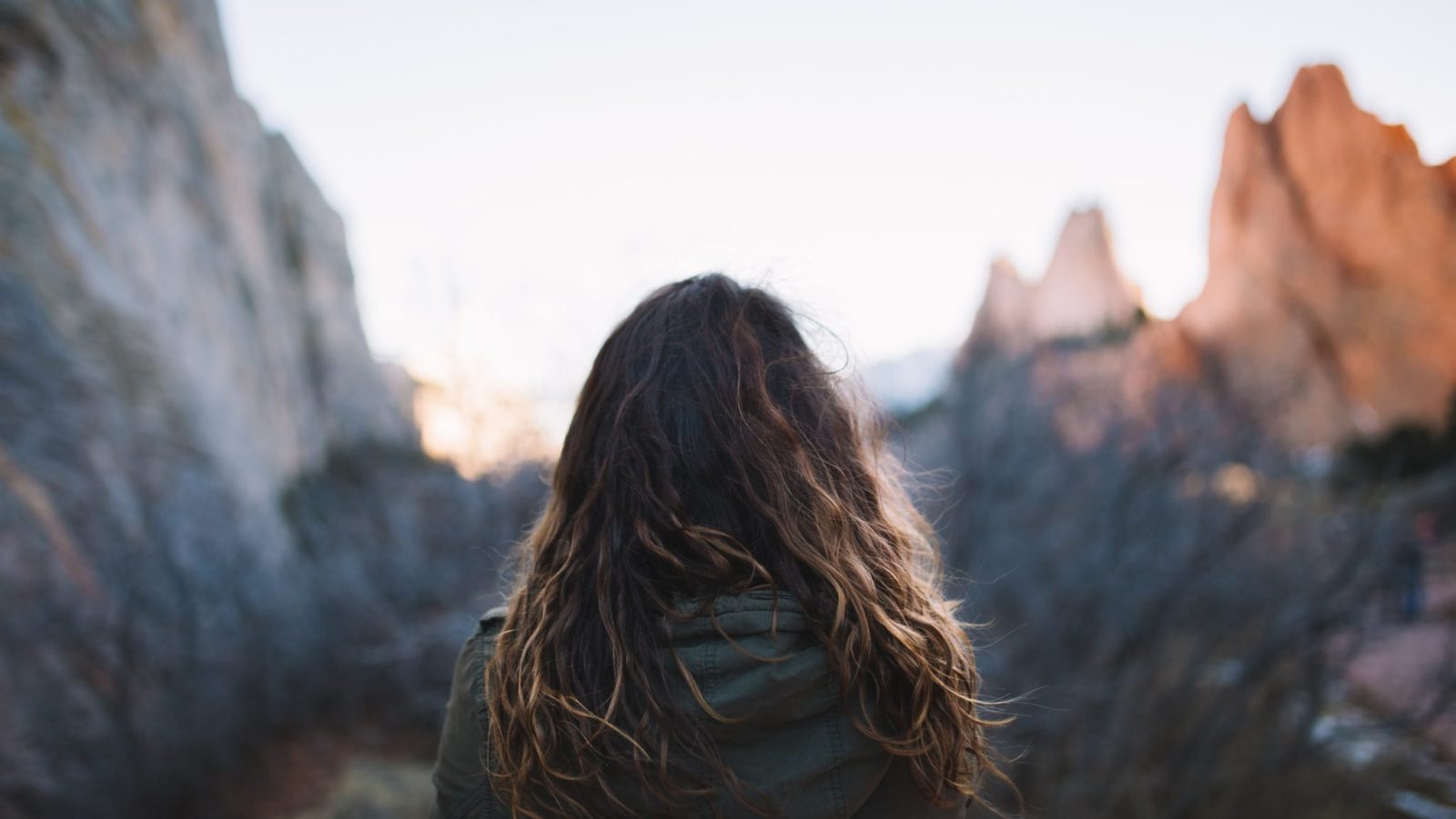 woman in front of mountain